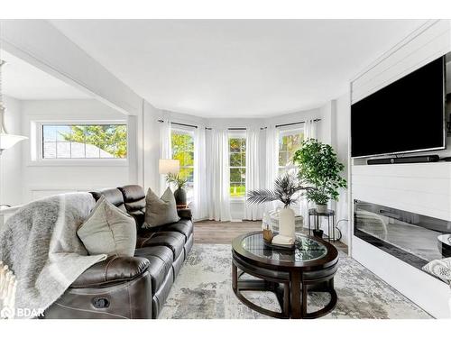 35 Reid Crescent, Collingwood, ON - Indoor Photo Showing Living Room With Fireplace