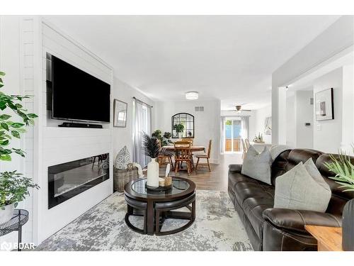 35 Reid Crescent, Collingwood, ON - Indoor Photo Showing Living Room With Fireplace