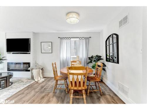 35 Reid Crescent, Collingwood, ON - Indoor Photo Showing Dining Room With Fireplace