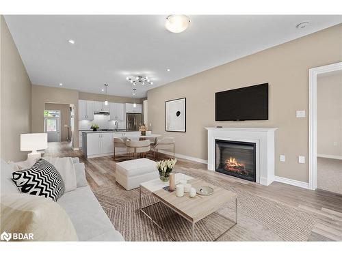 29-17 Lakewood Crescent, Bobcaygeon, ON - Indoor Photo Showing Living Room With Fireplace