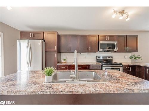 143 Monique Crescent, Barrie, ON - Indoor Photo Showing Kitchen With Stainless Steel Kitchen With Double Sink With Upgraded Kitchen