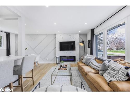 4 Curtiss Court, Barrie, ON - Indoor Photo Showing Living Room With Fireplace