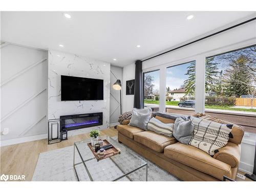 4 Curtiss Court, Barrie, ON - Indoor Photo Showing Living Room With Fireplace