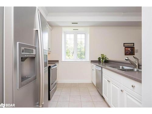 401-200 Collier Street, Barrie, ON - Indoor Photo Showing Kitchen With Double Sink