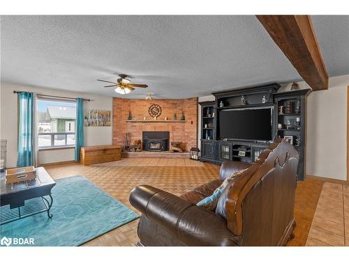 6511 21/22 Sideroad Nottawasaga, Stayner, ON - Indoor Photo Showing Living Room With Fireplace