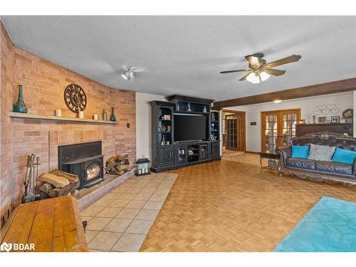 6511 21/22 Sideroad Nottawasaga, Stayner, ON - Indoor Photo Showing Living Room With Fireplace