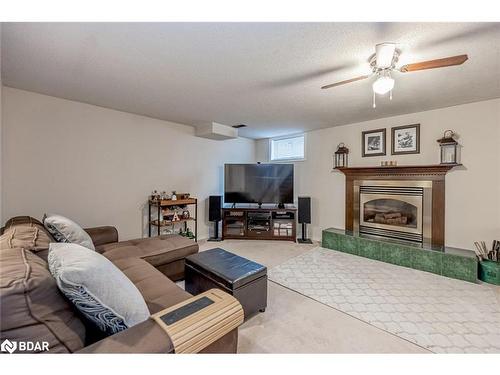 11 Nugent Court, Barrie, ON - Indoor Photo Showing Living Room With Fireplace