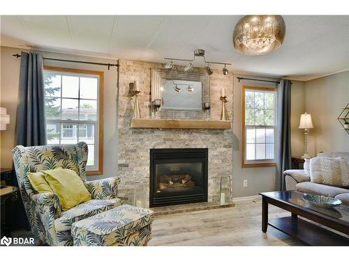 3 St. James Place, Wasaga Beach, ON - Indoor Photo Showing Living Room With Fireplace