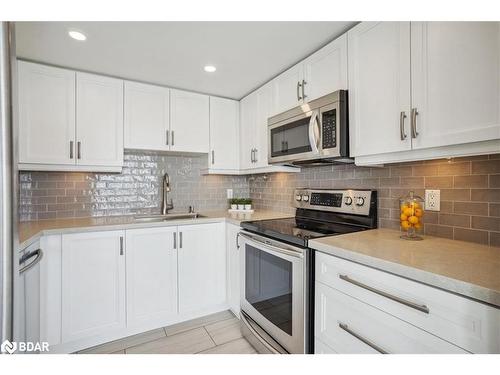 203-65 Ellen Street, Barrie, ON - Indoor Photo Showing Kitchen With Upgraded Kitchen