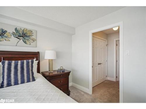 203-65 Ellen Street, Barrie, ON - Indoor Photo Showing Bedroom