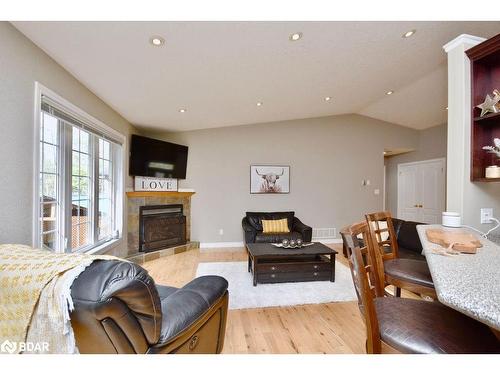 8 Nadia Crescent, Tiny, ON - Indoor Photo Showing Living Room With Fireplace