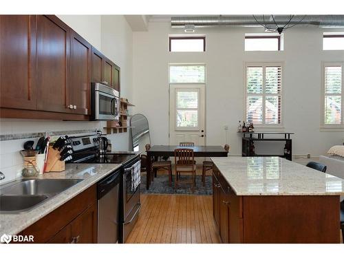 212-200 Stinson Street, Hamilton, ON - Indoor Photo Showing Kitchen With Double Sink