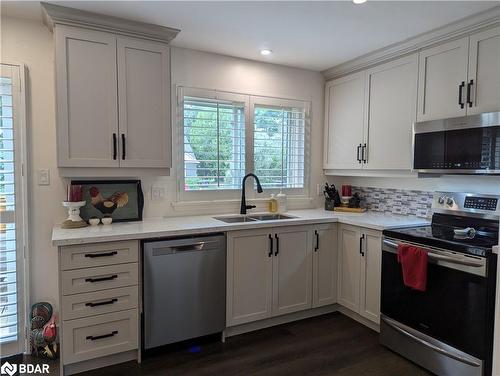 211 Sunset Crescent, Stroud, ON - Indoor Photo Showing Kitchen With Stainless Steel Kitchen With Double Sink