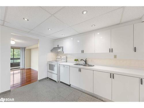 304-181 Collier Street, Barrie, ON - Indoor Photo Showing Kitchen With Double Sink