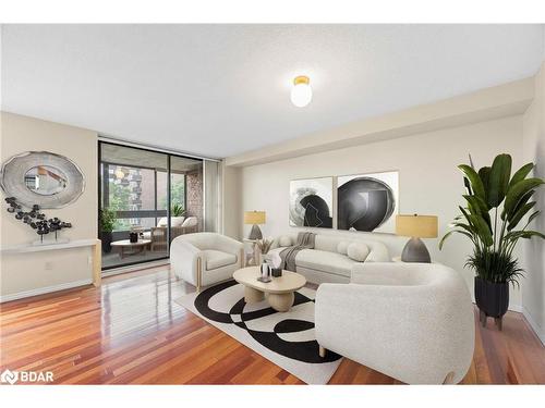 304-181 Collier Street, Barrie, ON - Indoor Photo Showing Living Room