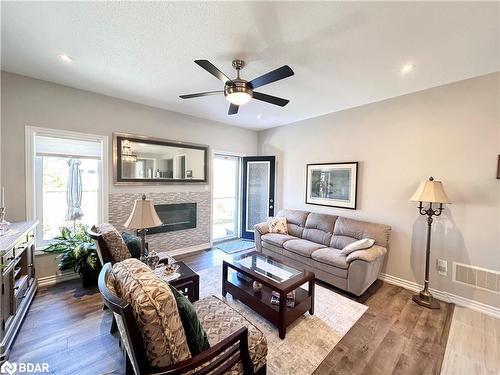 26 Bianca Crescent, Wasaga Beach, ON - Indoor Photo Showing Living Room With Fireplace