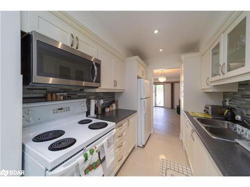 25 Overlord Crescent, Scarborough, ON - Indoor Photo Showing Kitchen With Double Sink