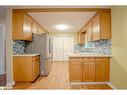 16 Tecumseth Pines Drive, New Tecumseth, ON  - Indoor Photo Showing Kitchen 