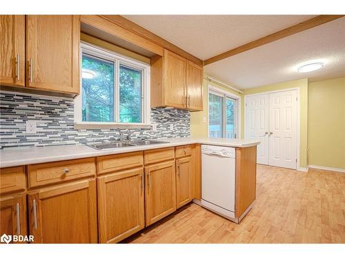 16 Tecumseth Pines Drive, New Tecumseth, ON - Indoor Photo Showing Kitchen With Double Sink