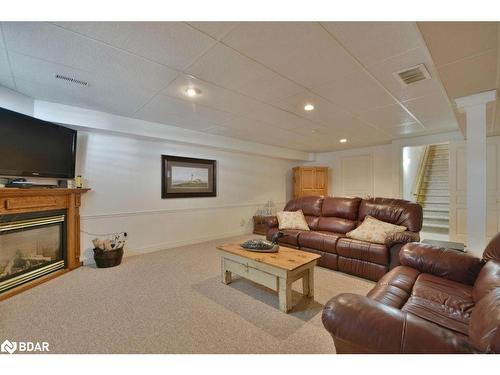 12 Willow Bay Drive, Springwater, ON - Indoor Photo Showing Living Room With Fireplace