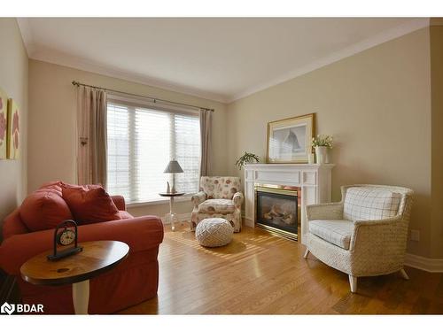 12 Willow Bay Drive, Springwater, ON - Indoor Photo Showing Living Room With Fireplace