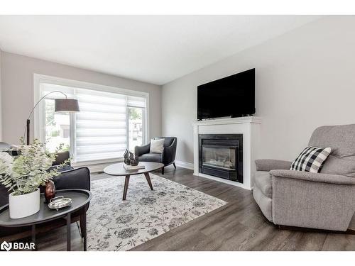 279 Anne Street N, Barrie, ON - Indoor Photo Showing Living Room With Fireplace