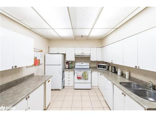 801-181 Collier Street, Barrie, ON - Indoor Photo Showing Kitchen With Double Sink