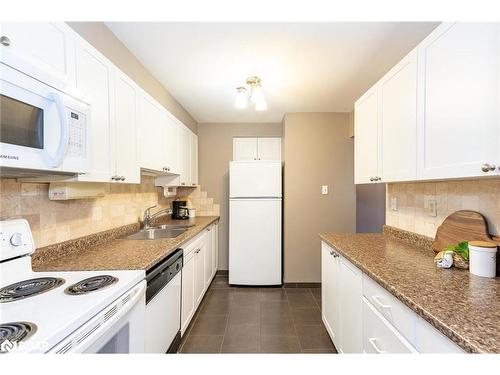 801-181 Collier Street, Barrie, ON - Indoor Photo Showing Kitchen With Double Sink