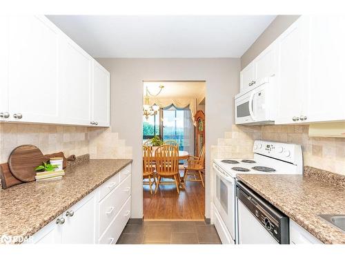 801-181 Collier Street, Barrie, ON - Indoor Photo Showing Kitchen