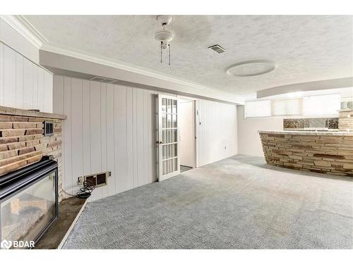 16 Lay Street, Barrie, ON - Indoor With Fireplace