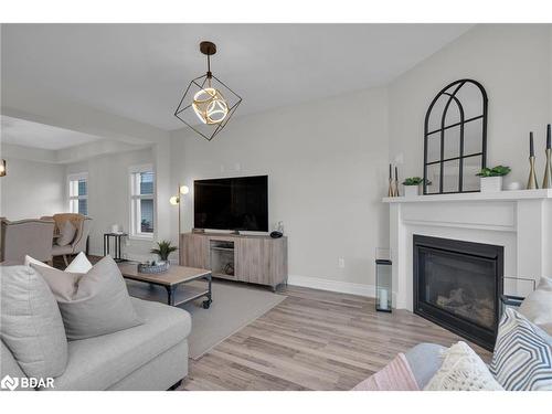 206 Prescott Drive, Stayner, ON - Indoor Photo Showing Living Room With Fireplace