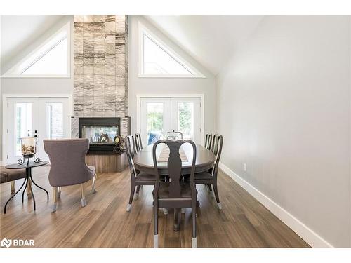 94 42Nd Street S, Wasaga Beach, ON - Indoor Photo Showing Dining Room With Fireplace