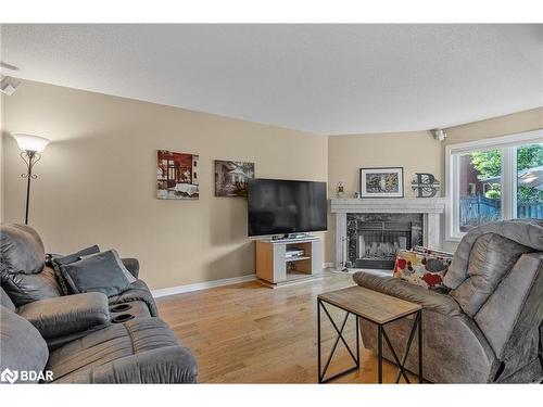 7 Bishop Drive, Barrie, ON - Indoor Photo Showing Living Room With Fireplace