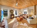 4 Spruce Street, Baysville, ON  - Indoor Photo Showing Living Room With Fireplace 