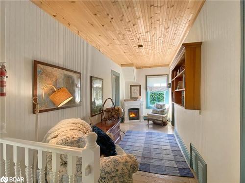 4 Spruce Street, Baysville, ON - Indoor Photo Showing Other Room With Fireplace