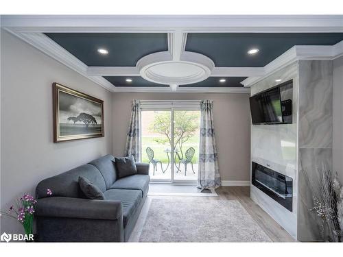 K1-155 Edgehill Drive, Barrie, ON - Indoor Photo Showing Living Room With Fireplace