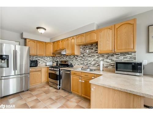 1222 Inniswood Street, Innisfil, ON - Indoor Photo Showing Kitchen With Double Sink