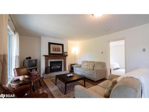 179 West Point Sands Road, Huntsville, ON - Indoor Photo Showing Living Room With Fireplace