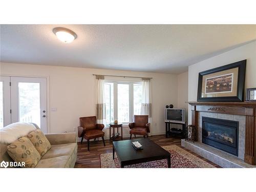 179 West Point Sands Road, Huntsville, ON - Indoor Photo Showing Living Room With Fireplace