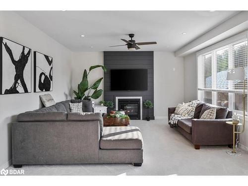 95 Trail Boulevard, Minesing, ON - Indoor Photo Showing Living Room With Fireplace