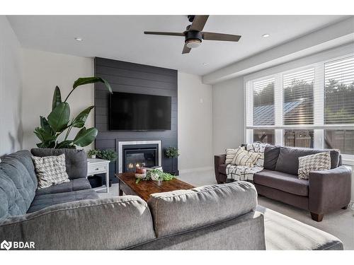 95 Trail Boulevard, Minesing, ON - Indoor Photo Showing Living Room With Fireplace