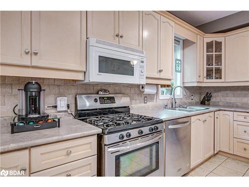 19 Mccarthy Court, Barrie, ON - Indoor Photo Showing Kitchen With Double Sink