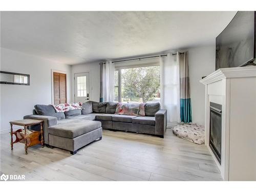 2244 Willard Avenue, Innisfil, ON - Indoor Photo Showing Living Room With Fireplace