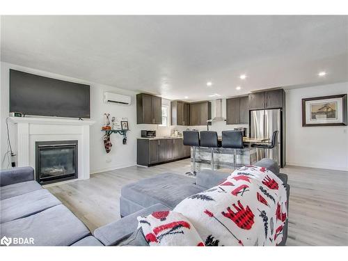 2244 Willard Avenue, Innisfil, ON - Indoor Photo Showing Living Room With Fireplace