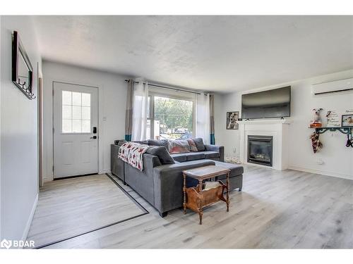 2244 Willard Avenue, Innisfil, ON - Indoor Photo Showing Living Room With Fireplace