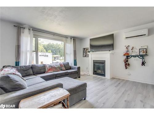 2244 Willard Avenue, Innisfil, ON - Indoor Photo Showing Living Room With Fireplace