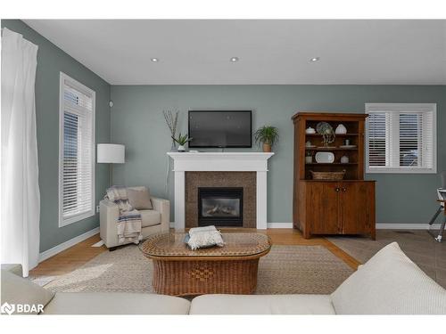 54 Ellis Crescent, Lindsay, ON - Indoor Photo Showing Living Room With Fireplace