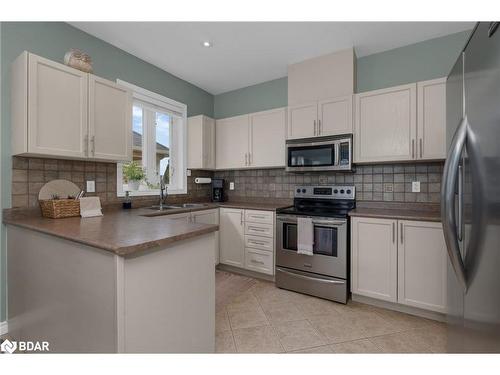 54 Ellis Crescent, Lindsay, ON - Indoor Photo Showing Kitchen With Double Sink