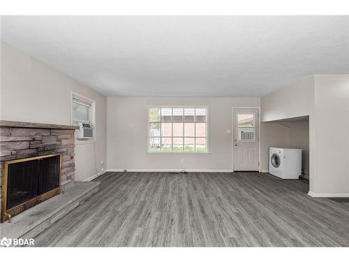 138 Peel Street, Barrie, ON - Indoor Photo Showing Living Room With Fireplace