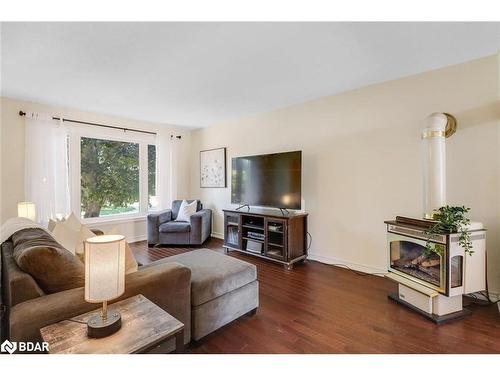 2 Carmichael Court, Orillia, ON - Indoor Photo Showing Living Room With Fireplace